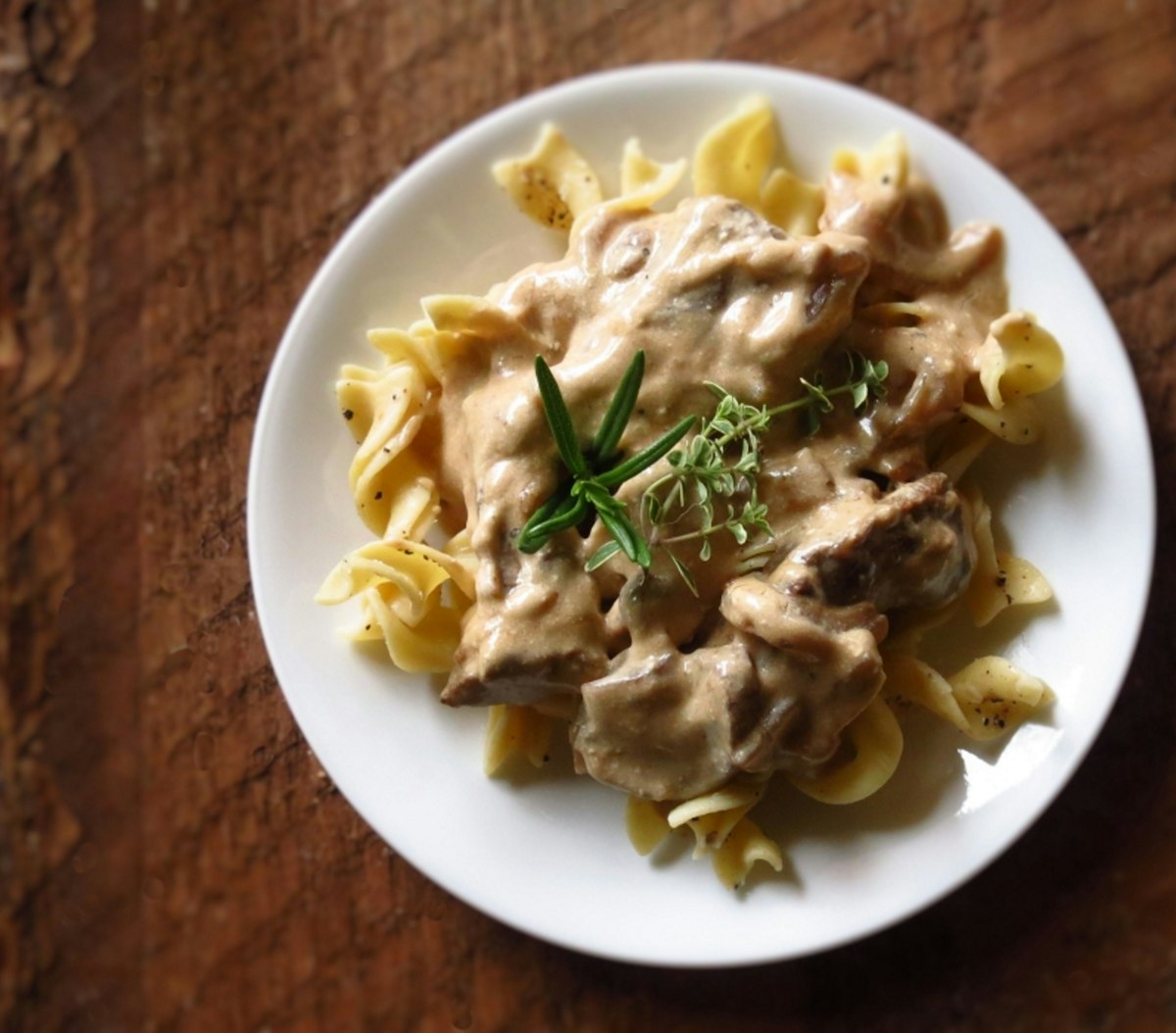 Beef stroganoff in a creamy mushroom sauce served over egg noodles