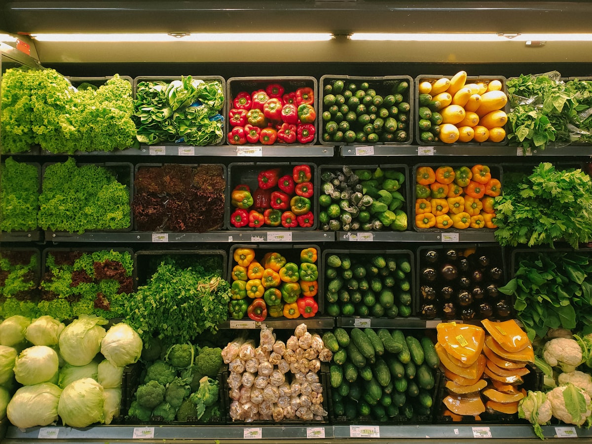Fresh vegetables arranged on a kitchen counter