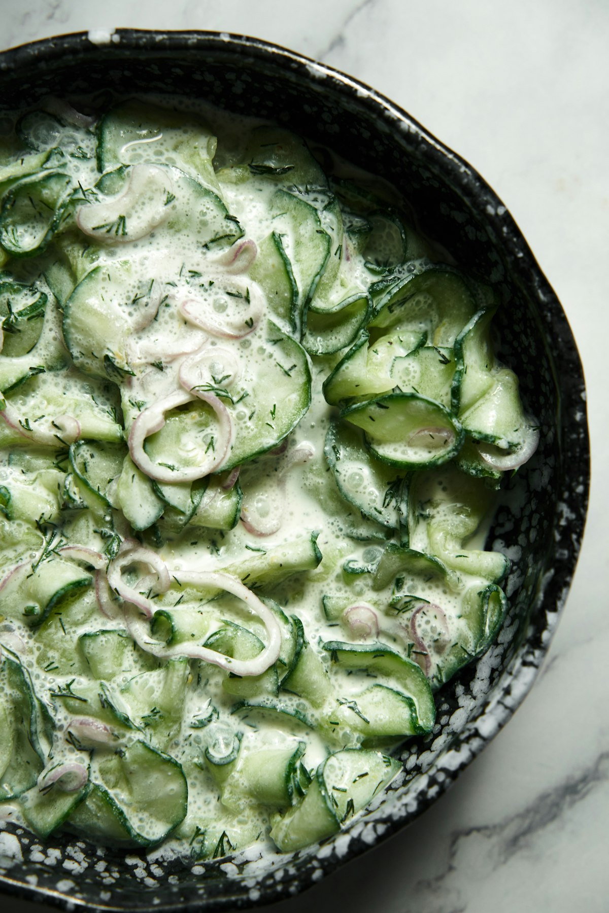 Ribboned cucumber in a garlicky herbed yogurt dressing with dill