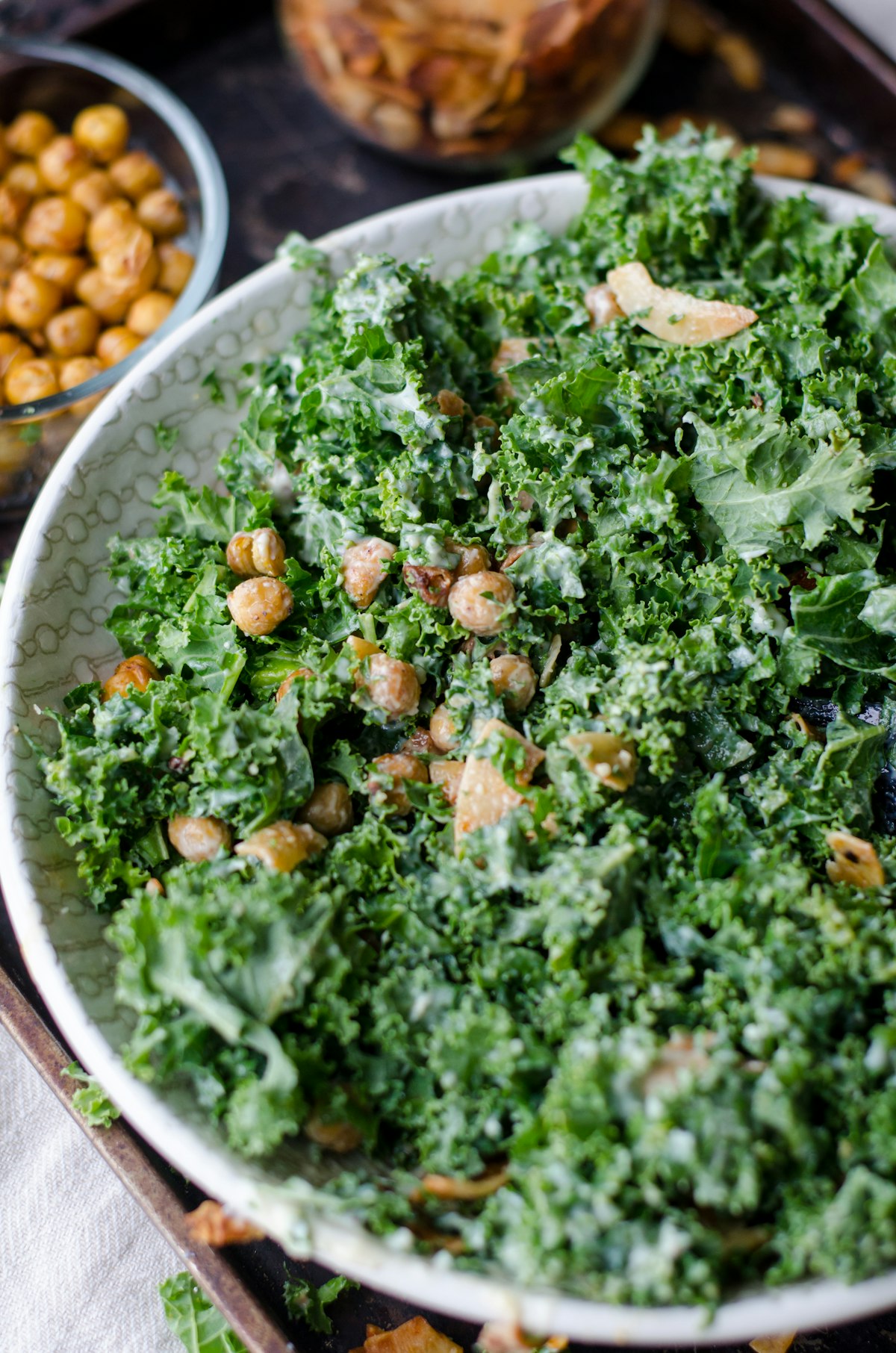 Massaged curly kale salad in a creamy dressing with toasted seeds